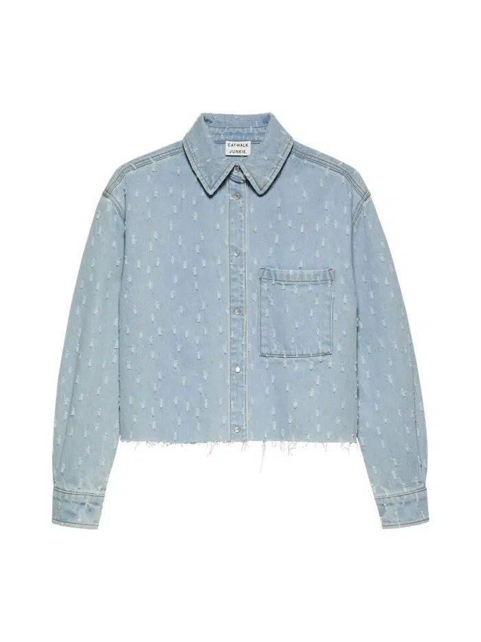 Denim blouse with textured fabric